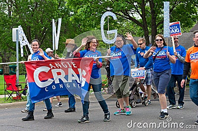 Craig Supporters at Parade Wave to Crowd Editorial Stock Photo
